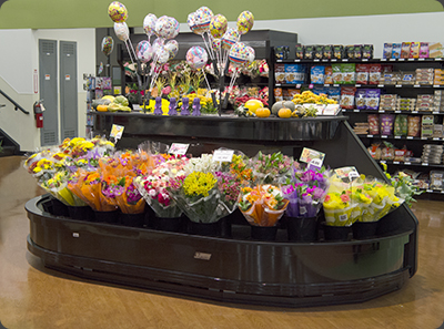 Refrigerated self-watering floral island display